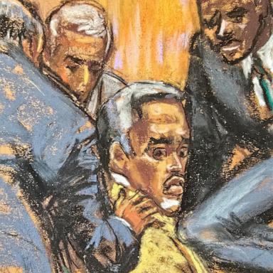 PHOTO: Defense lawyers comfort Sean "Diddy" Combs while discussing how to handle a note sent by jurors that they had reached a verdict on four of the five counts against him, during Combs' sex trafficking trial in New York City, July 1, 2025.