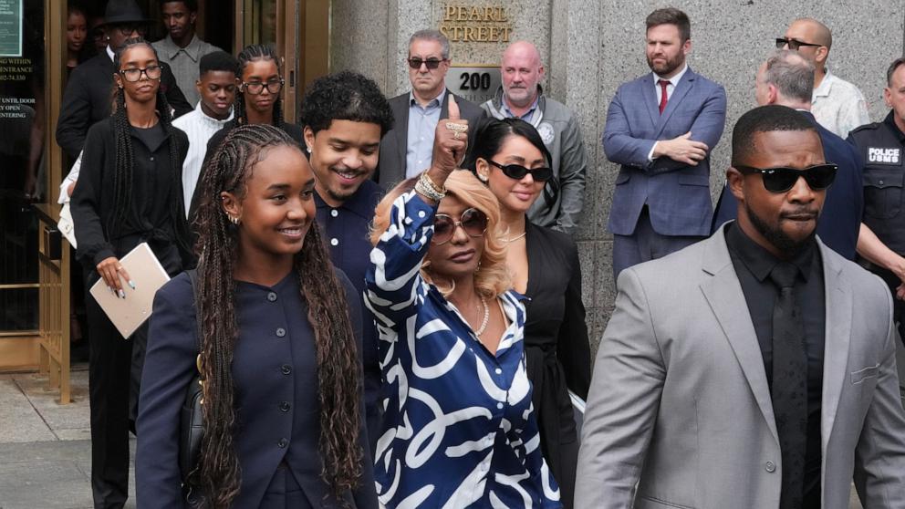 PHOTO: Janice Combs mother of Sean "Diddy" Combs, gives a thumbs up as she departs with her children and family members at Manhattan's Federal Court as jury reached a full verdict in Sean "Diddy" Combs' trial, July 2, 2025, in New York City.