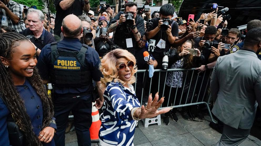 PHOTO: Janice Combs mother of Sean "Diddy" Combs, waves as she departs with her granddaughter Chance Combs at Manhattan's Federal Court as jury reached a full verdict in Sean "Diddy" Combs' sex trafficking trial, July 2, 2025, in New York City.