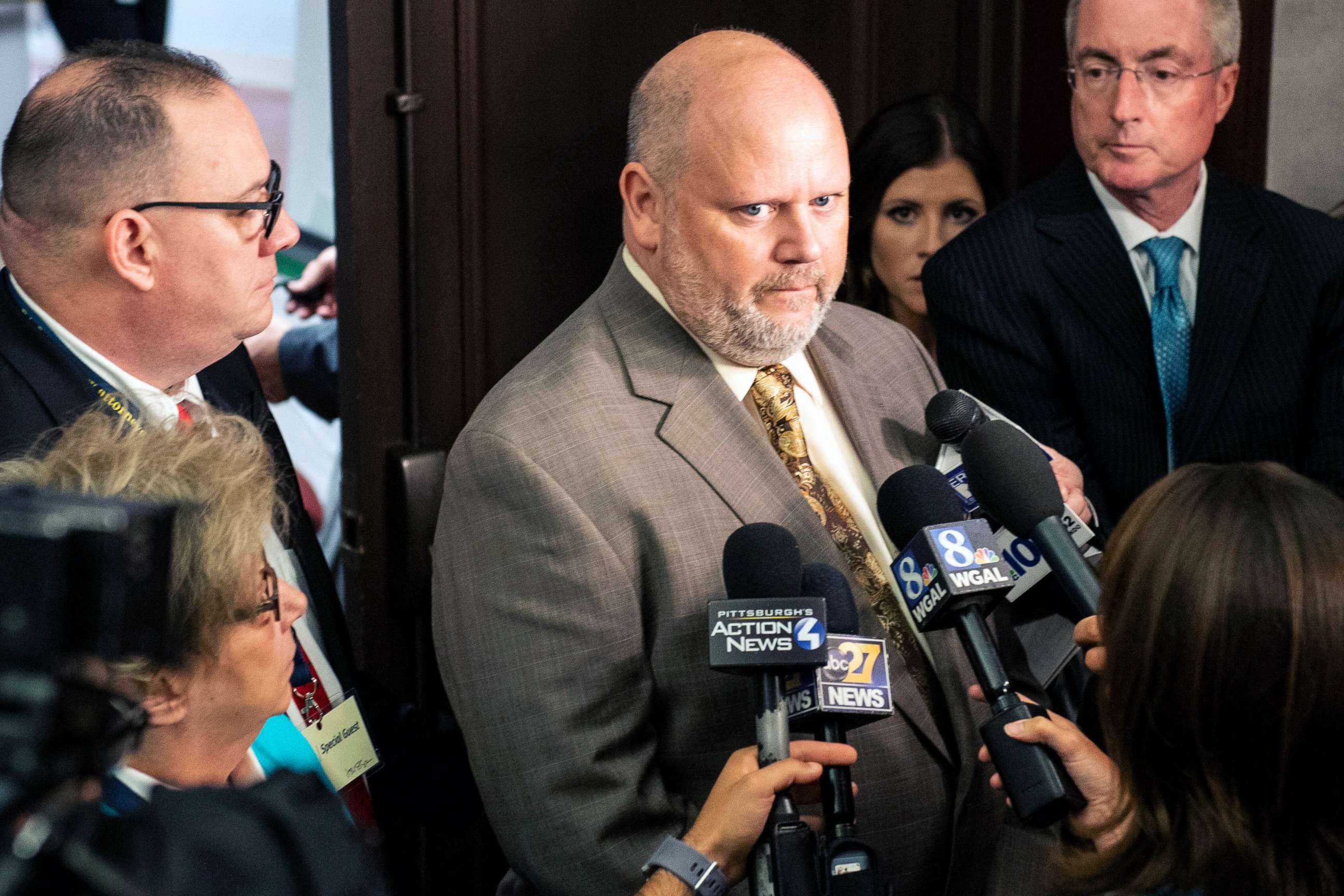 PHOTO: Survivor James Faluszczuk, who was abused by a priest in the Erie diocese, center, speaks with media after the press conference, Aug. 14, 2018, in Harrisburg, Penn.