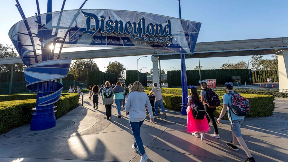 PHOTO: Visitors attend Disneyland Park, Feb. 25, 2020, in Anaheim, California.