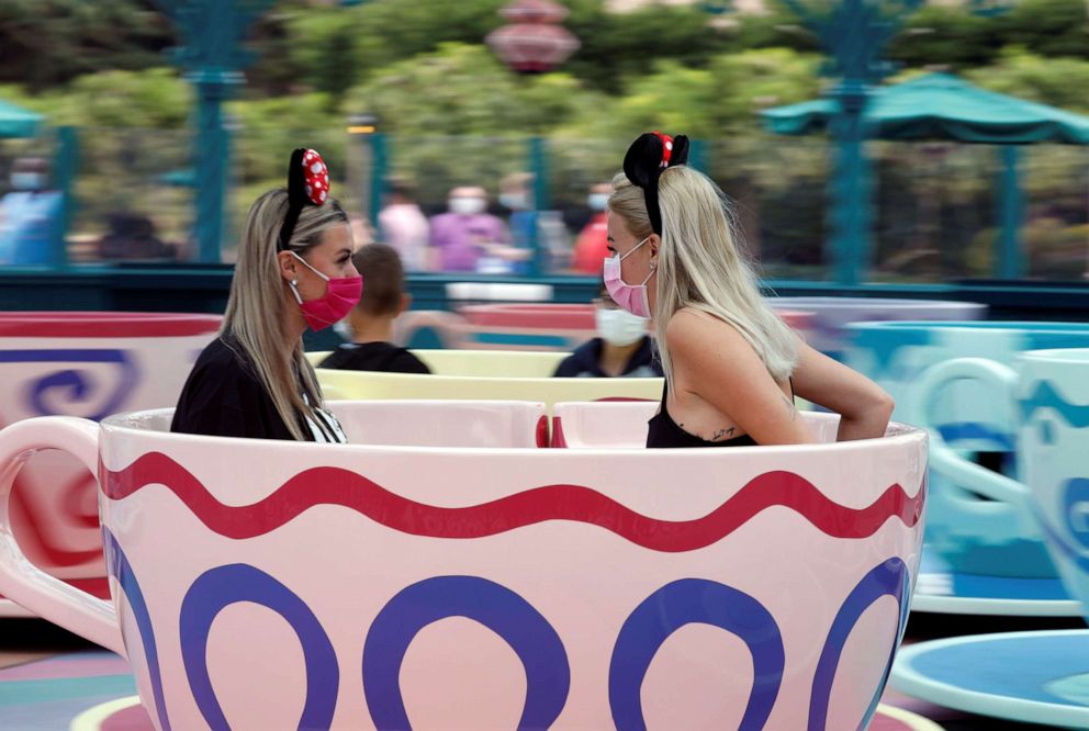 PHOTO: Visitors enjoy the Mad Hatters Tea cups at Disneyland Paris as the theme park reopens its doors to the public in Marne-la-Vallee in France, July 15, 2020.
