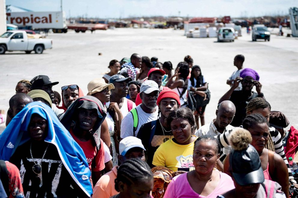 PHOTO: People await evacuation by boat at the port after Hurricane Dorian, Sept. 7, 2019, in Marsh Harbor, Great Abaco.