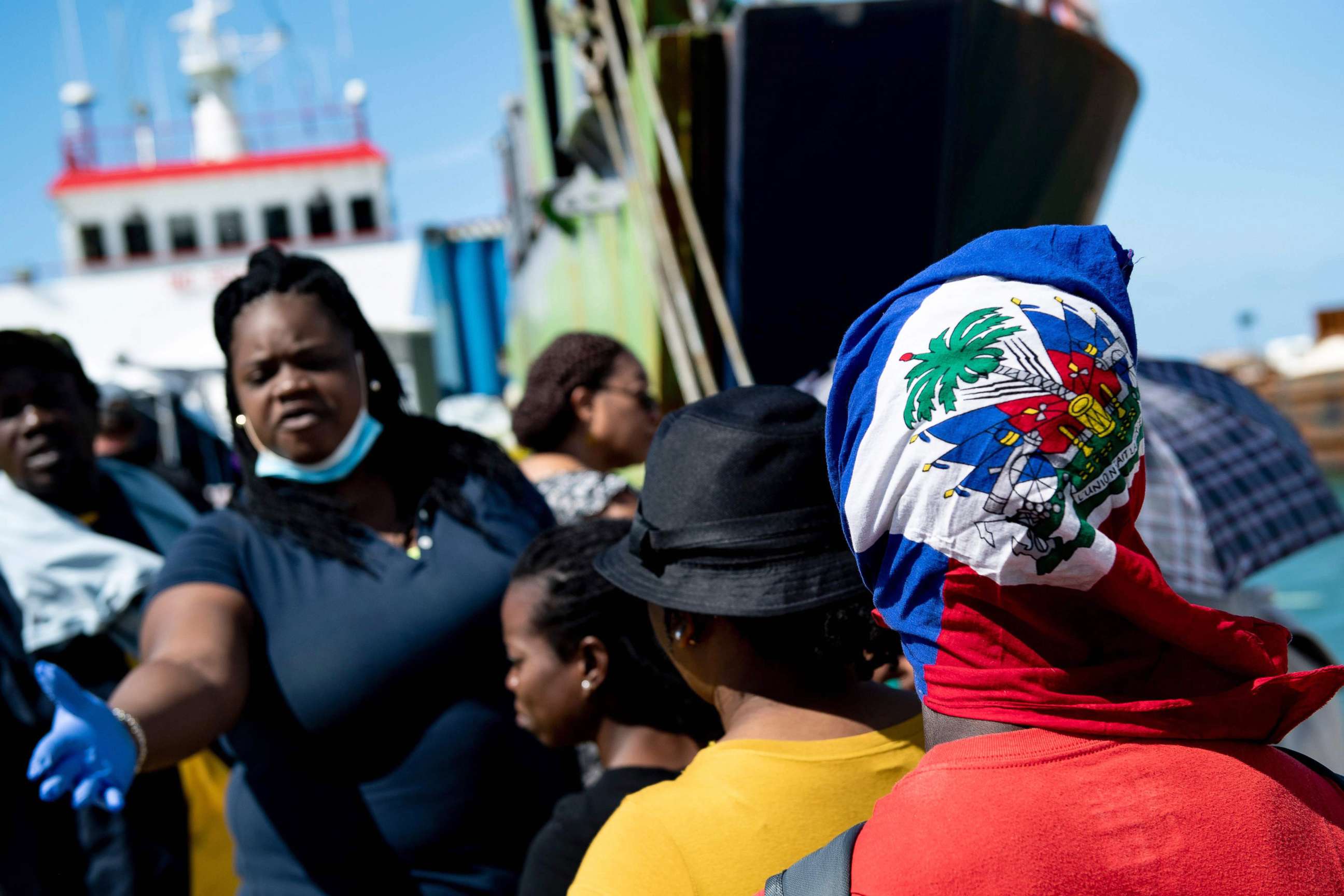 PHOTO: People board a cargo ship for evacuation to Nassau at the port in Marsh Harbour, Great Abaco, Sept. 7, 2019, in the aftermath of Hurricane Dorian.