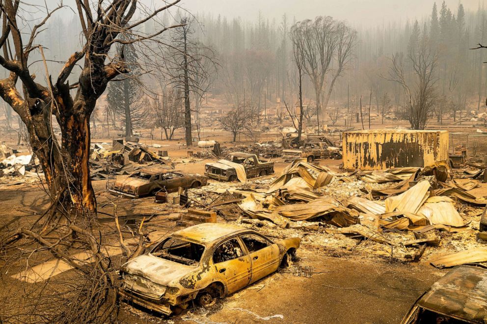 PHOTO: The remains of cars and homes destroyed by the Dixie Fire line central Greenville on Aug. 5, 2021, in Plumas County, Calif.