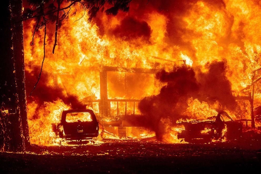 PHOTO: Flames consume a home on Highway 89 as the Dixie Fire tears through the Greenville community of Plumas County, Calif., Aug. 4, 2021. 