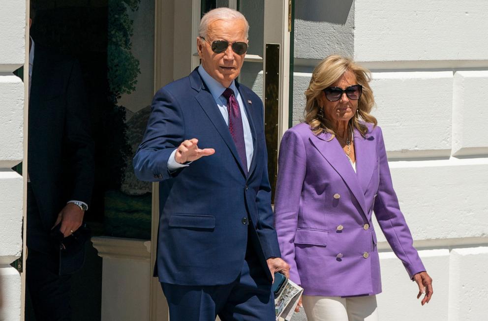 PHOTO: President Joe Biden and First Lady Jill Biden walk to board Marine One on the South Lawn of the White House as they prepare to travel to the Democratic National Convention, Aug. 19, 2024, in Washington.