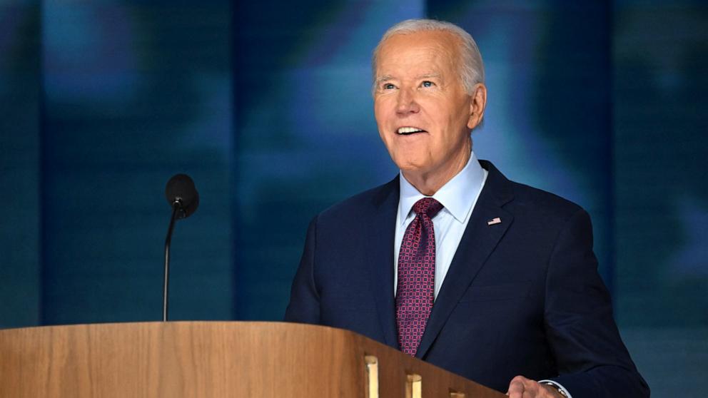PHOTO: President Joe Biden does a stage check before the start of the first day of the Democratic National Convention, in Chicago, Aug. 19, 2024.