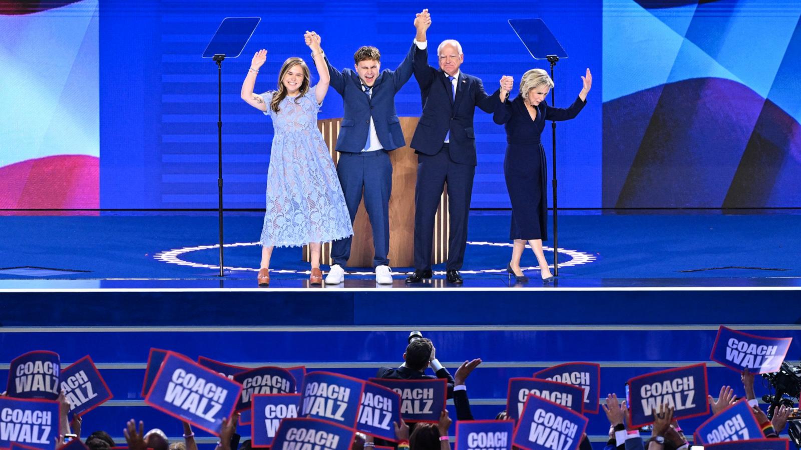 PHOTO: Minnesota Governor and Democratic vice-presidential candidate Tim Walz stands onstage with his daughter Hope, son Gus and wife Gwen Walz after he spoke at the Democratic National Convention in Chicago, August 21, 2024.