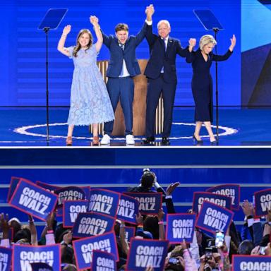 PHOTO: Minnesota Governor and Democratic vice-presidential candidate Tim Walz stands onstage with his daughter Hope, son Gus and wife Gwen Walz after he spoke at the Democratic National Convention in Chicago, August 21, 2024. 