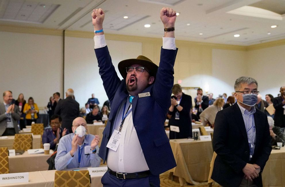 PHOTO: Manny Crespin, Vice Chair of the Democratic Party of New Mexico cheers after a vote at the DNC Winter Meeting on its Rules and Bylaws Committees recommendation to reorder the presidential primary calendar in 2024, in Philadelphia, on Feb. 4, 2023.