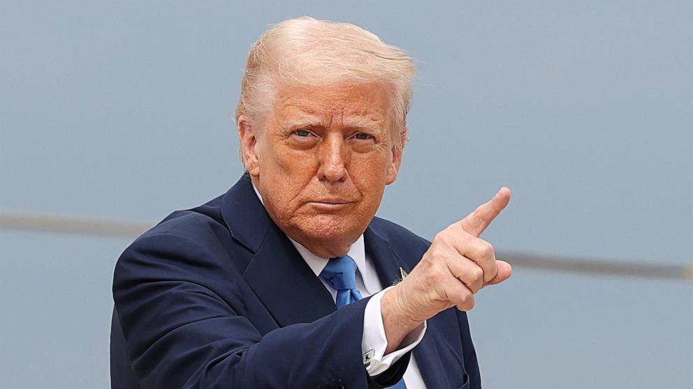 PHOTO: President Donald Trump boards Air Force One as he departs for Florida, at Joint Base Andrews, Maryland, March 28, 2025.