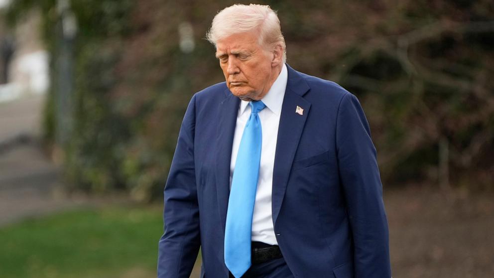 PHOTO: President Donald Trump walks from the Oval Office to board Marine One on the South Lawn of the White House en route to Florida, March 28, 2025, in Washington.