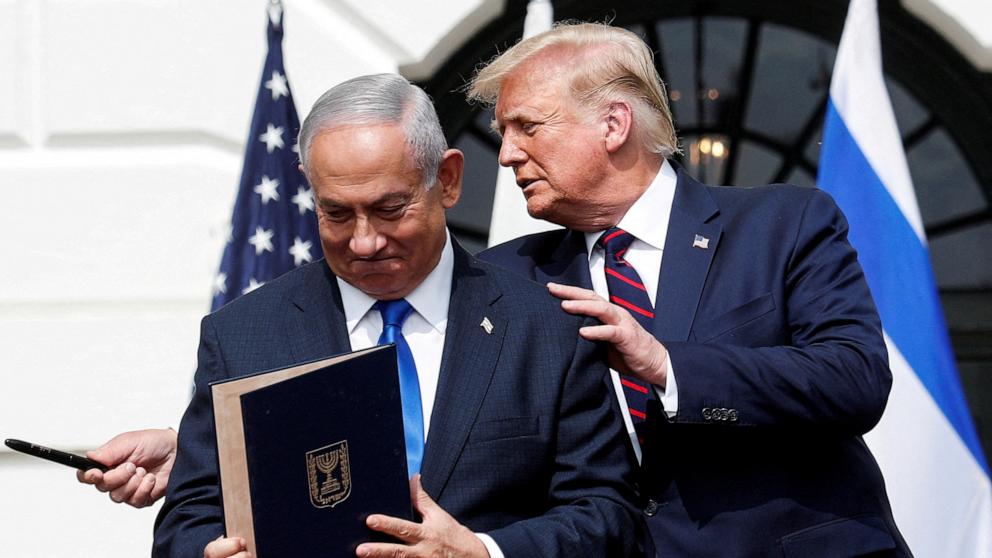 PHOTO: Israel's Prime Minister Benjamin Netanyahu stands with President Donald Trump after signing the Abraham Accords on the South Lawn of the White House in Washington, Sept. 15, 2020.