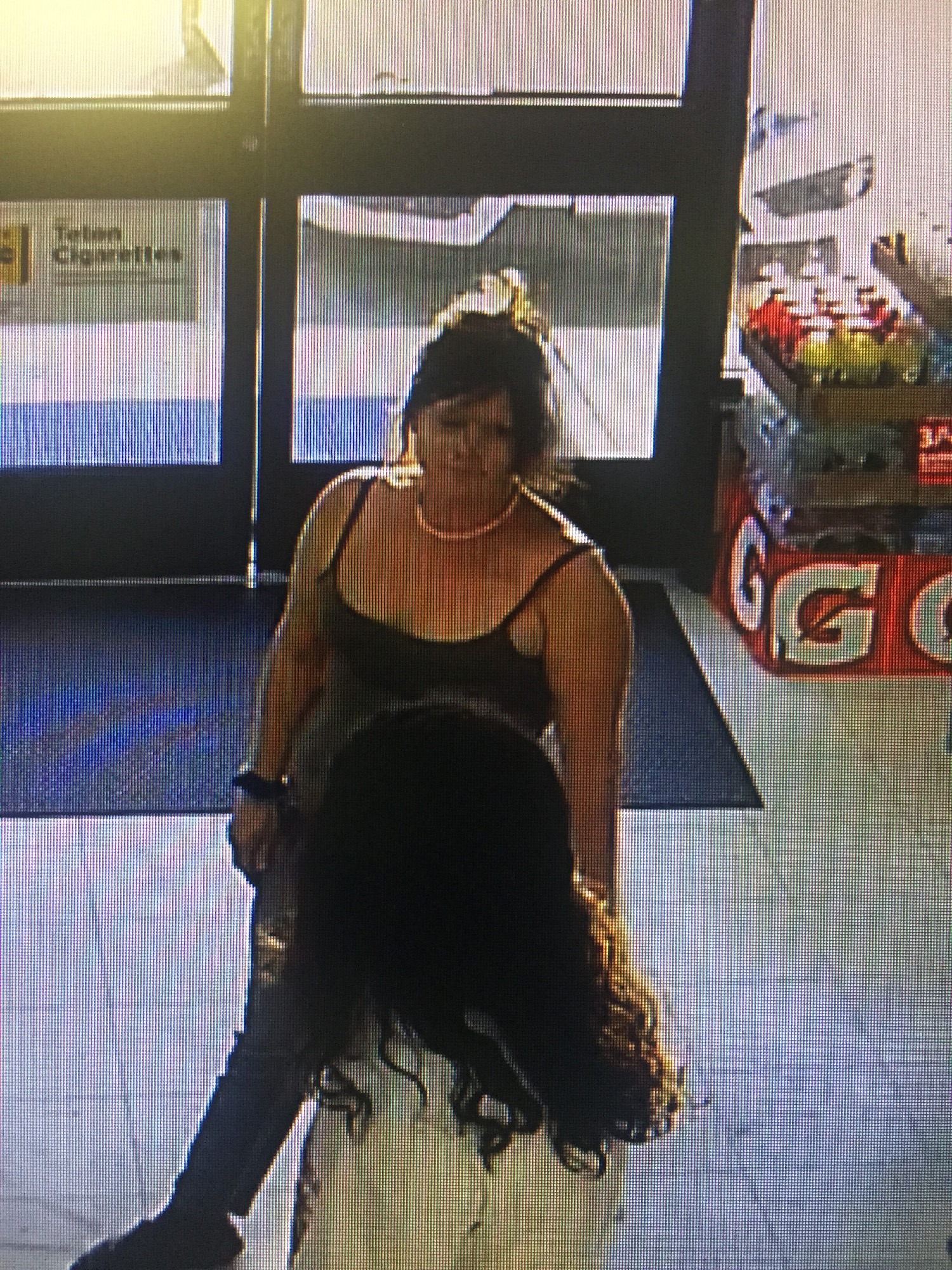 PHOTO: Authorities are searching for a woman caught on camera taking a dog from a 7-Eleven in Longmont, Colorado, after its owner had a seizure.