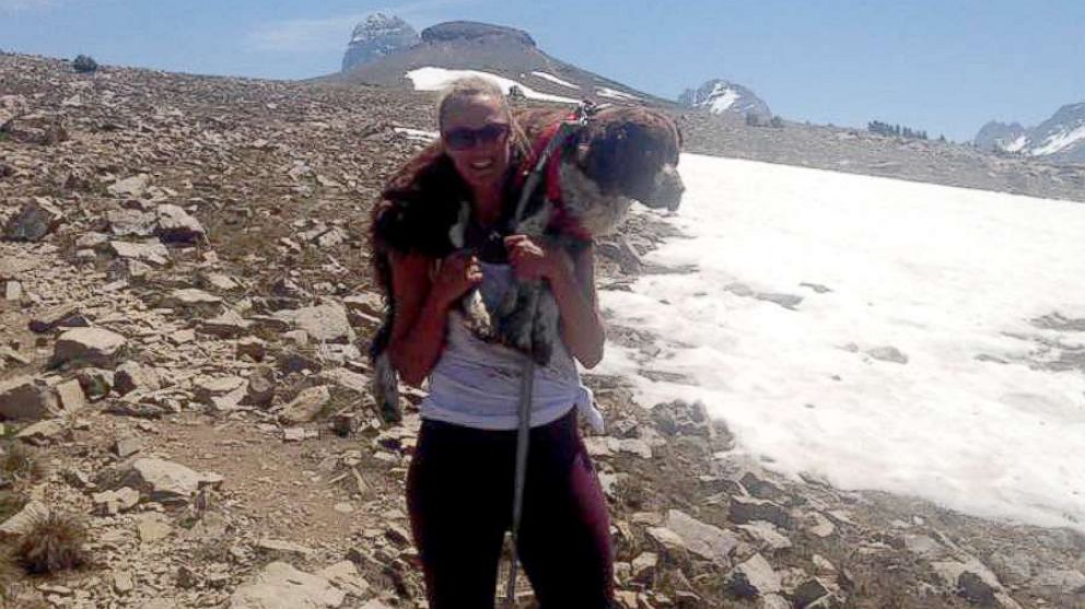 VIDEO: Single mom carries injured 55-pound dog on her shoulders down mountain