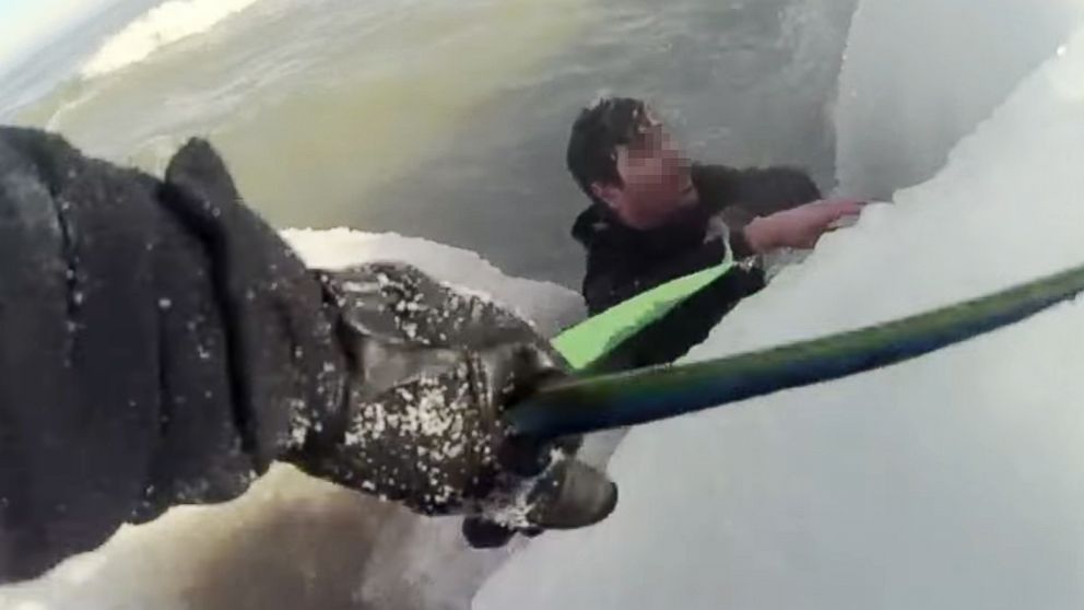 PHOTO: Chicago police rescue a man trapped in Lake Michigan after he jumped in to rescue his puppy, Jan. 27, 2019.