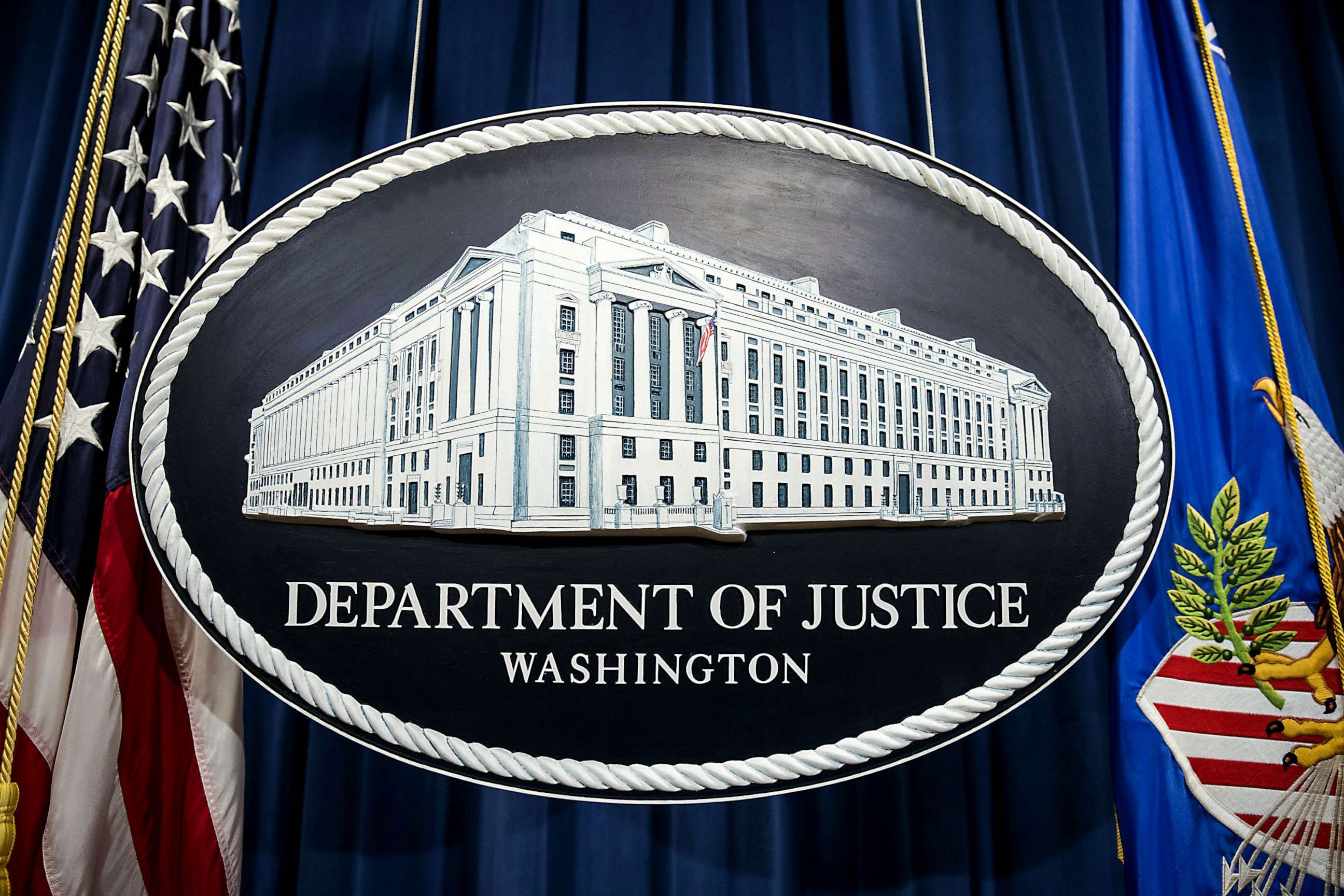 PHOTO: FILE - The Department of Justice logo hangs in Washington, Aug. 4, 2017.