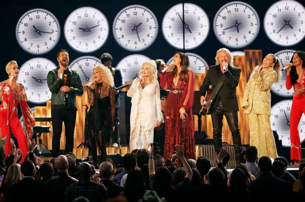 PHOTO: In this Feb. 10, 2019, file photo, Katy Perry, Phillip Sweet, Karen Fairchild, Dolly Parton, Kimberly Schlapman, Jimi Westbrook, Miley Cyrus and Kacey Musgraves perform "9 to 5" on the 61st Grammy Awards.