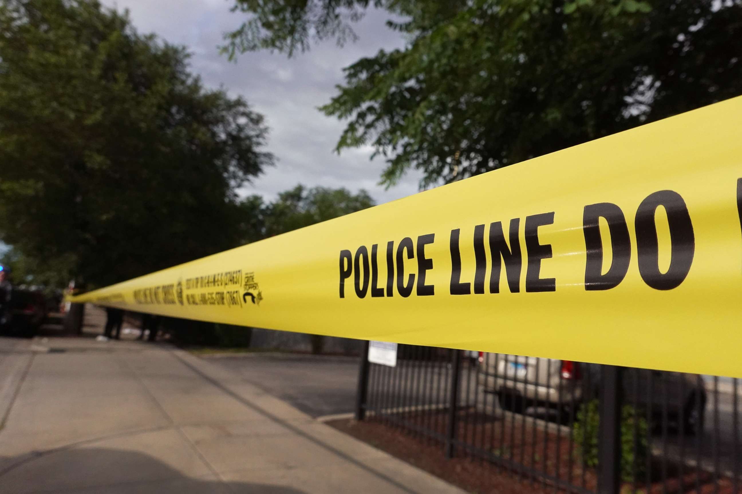 PHOTO: CHICAGO, ILLINOIS - JUNE 23: Police tape surrounds a crime scene where three people were shot at the Wentworth Gardens housing complex in the Bridgeport neighborhood on June 23, 2021 in Chicago, Illinois. 
