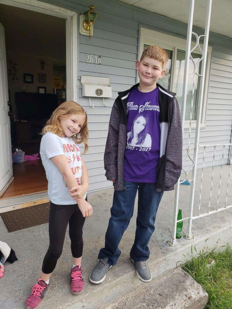 PHOTO: Tina Stewart's children, Addy, 8, and Shane, 12, remember their mother who was murdered in a domestic violence incident. Share wears a t-shirt with his mother's picture on it. 