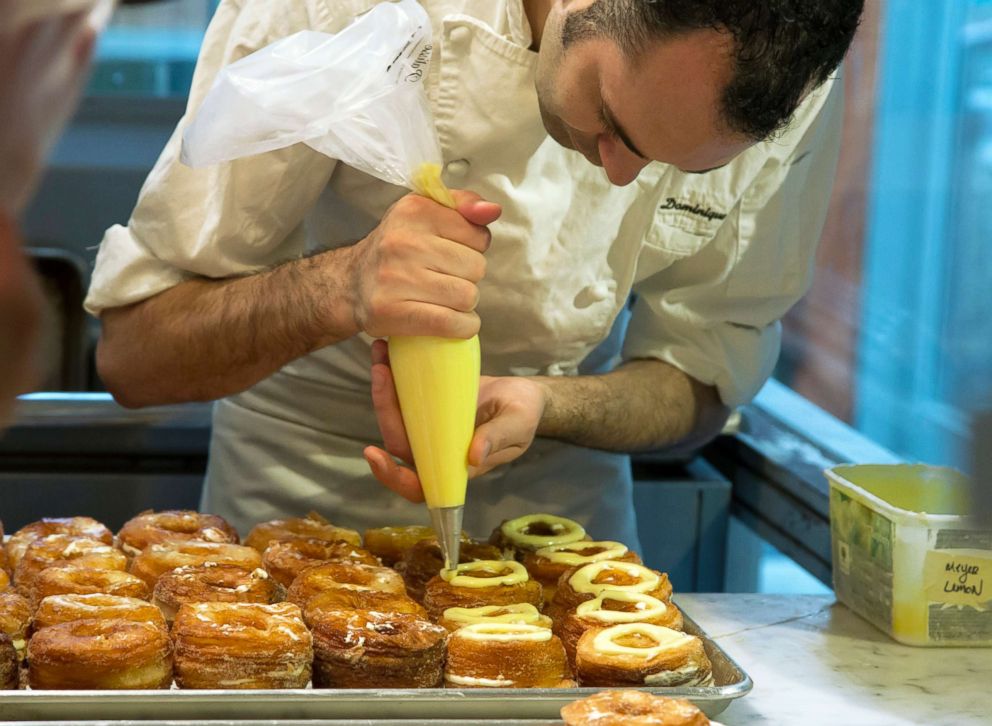 PHOTO: Chef Dominique Ansel making Cronuts, a croissant-donut hybrid, at the Dominique Ansel Bakery in New York in this June 3, 2013 file photo.