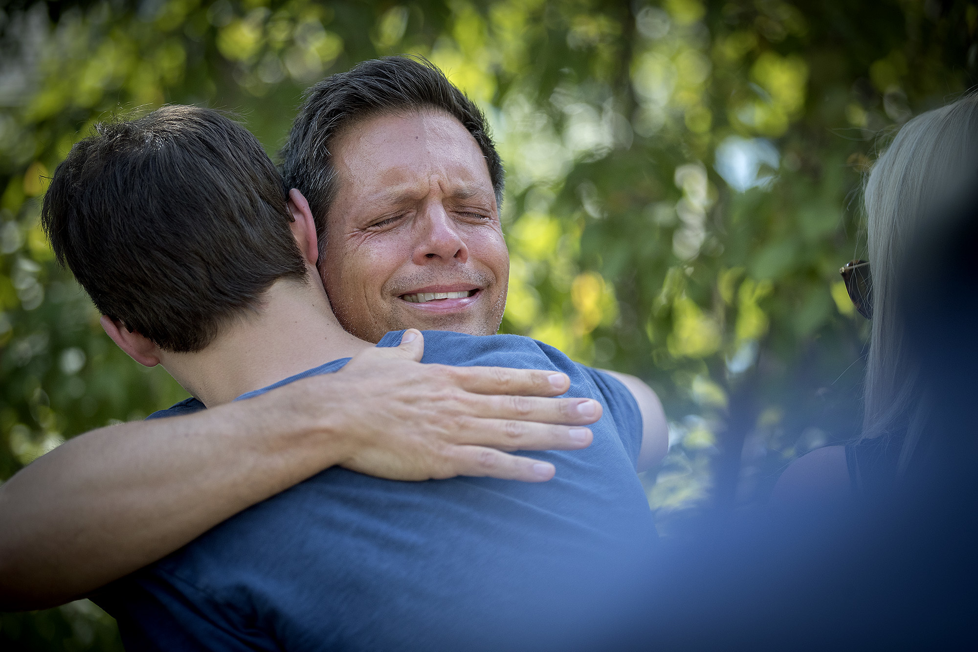 PHOTO: Don Damond is comforted by friends and family after making a statement to the press near his home after a Minneapolis police officer shot and killed his fiance Justine, July 17, 2017, in Minneapolis, Minnesota.