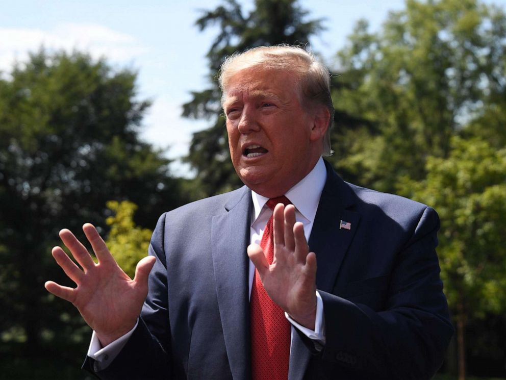 PHOTO: President Donald Trump speaks to the media as he departs the White House in Washington, Aug. 21, 2019.