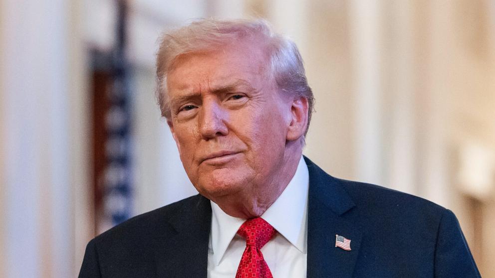 PHOTO: President Donald Trump arrives to honor the Louisiana State University and LSU Shreveport championship baseball teams in the East Room of the White House in Washington, October 20, 2025.