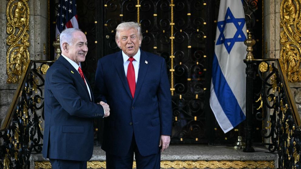 PHOTO: President Donald Trump greets Israeli Prime Minister Benjamin Netanyahu upon arrival at Trump's Mar-a-Lago residence in Palm Beach, Fla., December 29, 2025. 