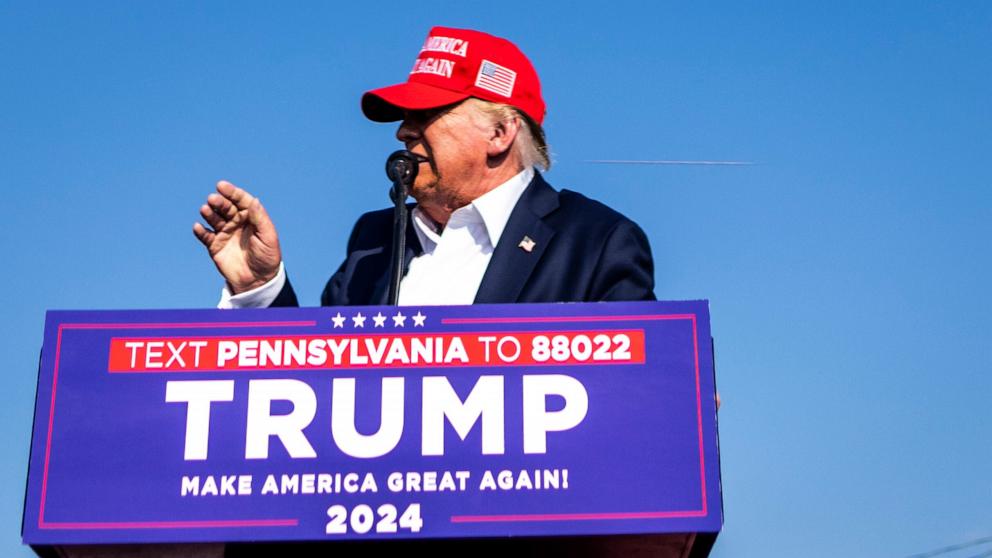 PHOTO: Former President Donald Trump on stage as gunshots are fired at his campaign rally in Butler, Pa., July 13, 2024. 