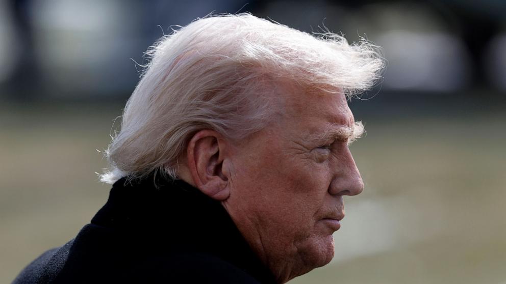 PHOTO: President Donald Trump speaks with the media as he heads to Marine One to travel to Iowa, from the White House in Washington, January 27, 2026.