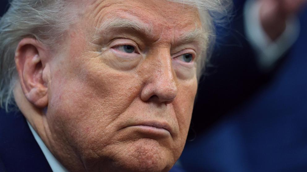 PHOTO: President Donald Trump prepares to sign executive orders in the Oval Office of the White House in Washington, May 22, 2025.