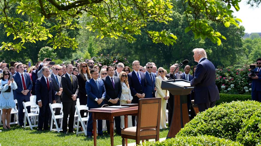 PHOTO: President Donald Trump speaks as memebers of the cabinet listen during a National Day of Prayer event in the Rose Garden of the White House, May 1, 2025, in Washington.