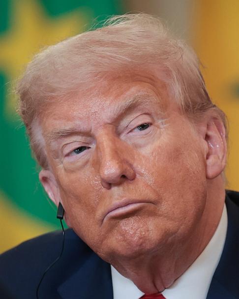President Donald Trump listens as African Leaders deliver remarks during a multilateral lunch in the State Dining Room of the White House July 9, 2025 in Washington.