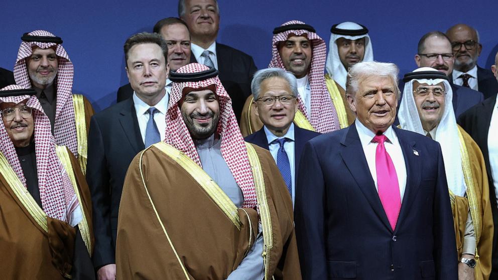PHOTO: President Donald Trump and Crown Prince and Prime Minister Mohammed bin Salman of Saudi Arabia stand for a photo with Tesla CEO Elon Musk, Nvidia CEO Jensen Huang at the U.S.-Saudi Investment Forum, November 19, 2025 in Washington.