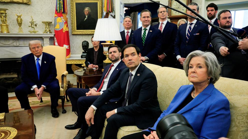 PHOTO: Secretary of State Marco Rubio, right, listens as President Donald Trump meets with France's President Emmanuel Macron in the Oval Office of the White House in Washington, Feb. 24, 2025.