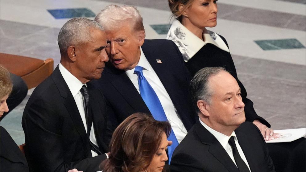 PHOTO: Former President Barack Obama, President-elect Donald Trump talk behind as Vice President Kamala Harris and second gentleman Doug Emhoff at the State Funeral Service for former President Jimmy Carter in Washington, Jan. 9, 2025.