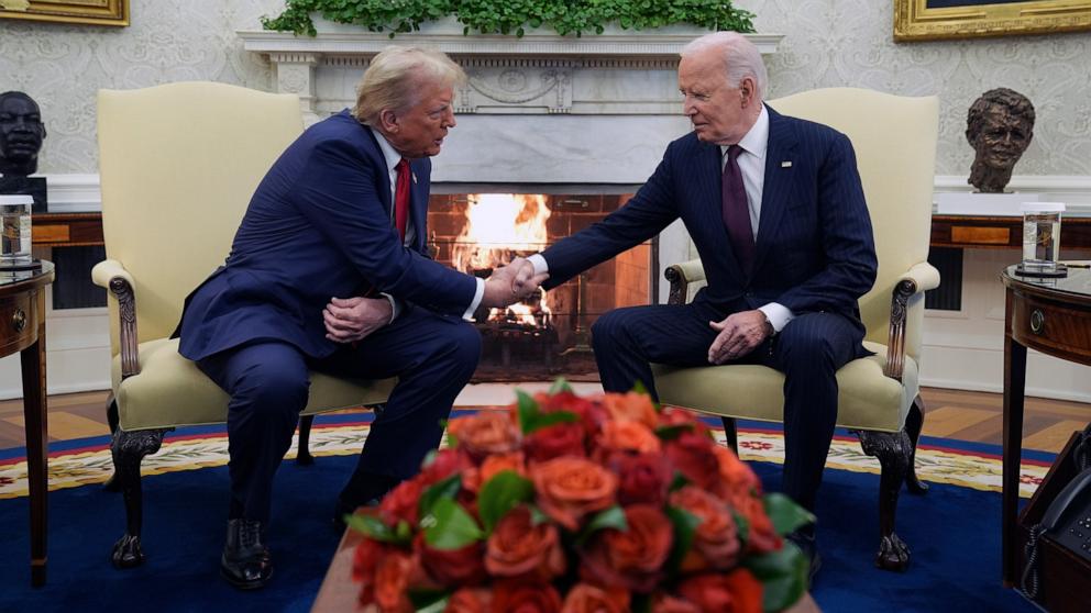 PHOTO: President Joe Biden shakes hands with President-elect Donald Trump during a meeting in the Oval Office of the White House in Washington, Nov. 13, 2024