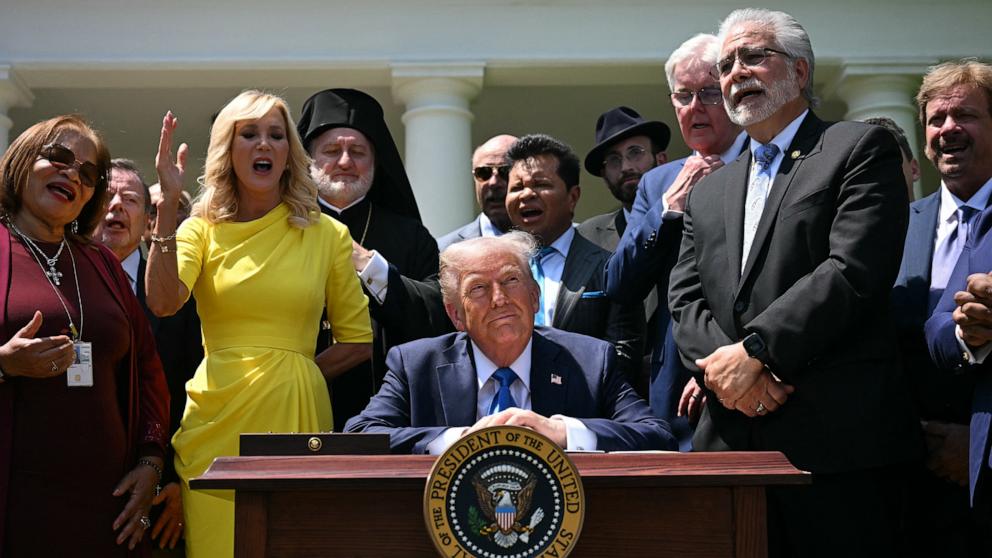 PHOTO: Pastor Paula White and other faith leaders paray behind President Donald Trump during a National Day of Prayer event in the Rose Garden of the White House in Washington, May 1, 2025.
