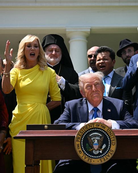 Pastor Paula White and other faith leaders paray behind President Donald Trump during a National Day of Prayer event in the Rose Garden of the White House in Washington, May 1, 2025. 
