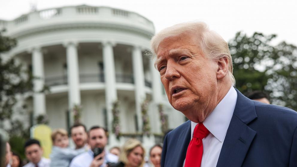 PHOTO: President Donald Trump speaks to the media during the annual White House Easter Egg Roll, on the South Lawn of the White House in Washington, April 21, 2025.