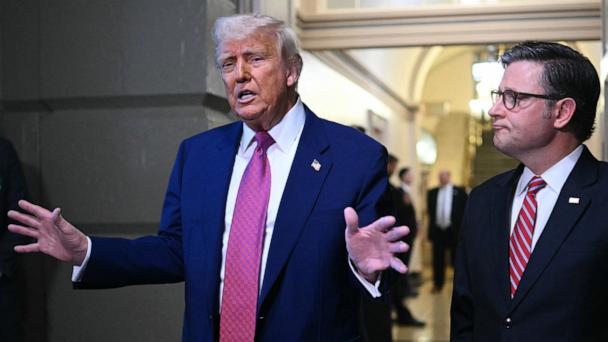 President Donald Trump and Speaker of the House Mike Johnson speak to the press after a House GOP Conference Meeting at the US Capitol in Washington, May 20, 2025.