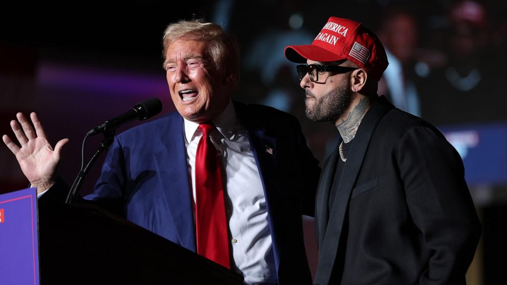 PHOTO: Republican presidential nominee, former U.S. President Donald Trump appears on stage with recording artist Nicky Jam during a campaign rally, Sept. 13, 2024, in Las Vegas.