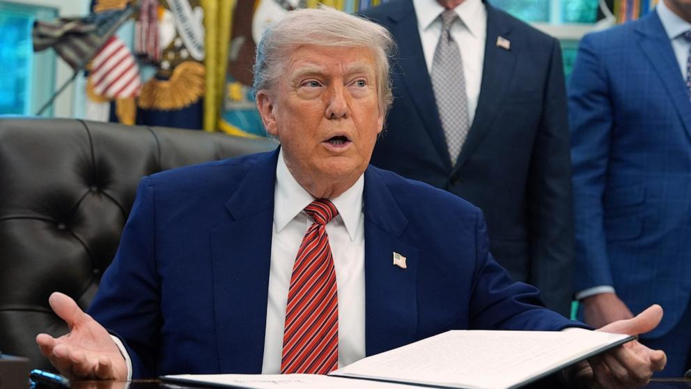 PHOTO: President Donald Trump speaks as signs an executive order regarding nuclear energy in the Oval Office of the White House, May 23, 2025, in Washington. 