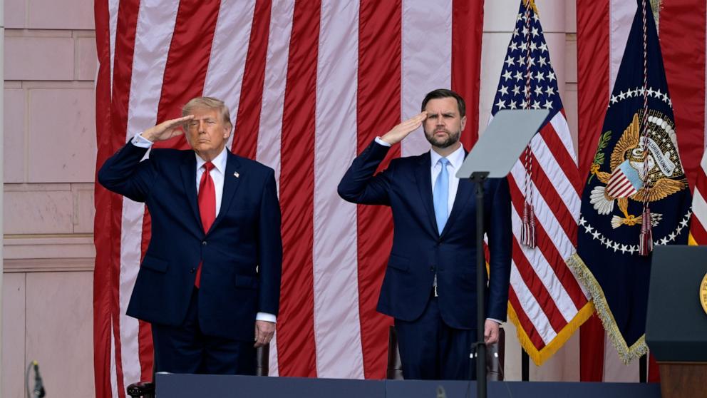 PHOTO: President Donald Trump and Vice President JD Vance, salute during the Memorial Day ceremony at Arlington National Cemetery, May 25, 2026, in Arlington, Va.
