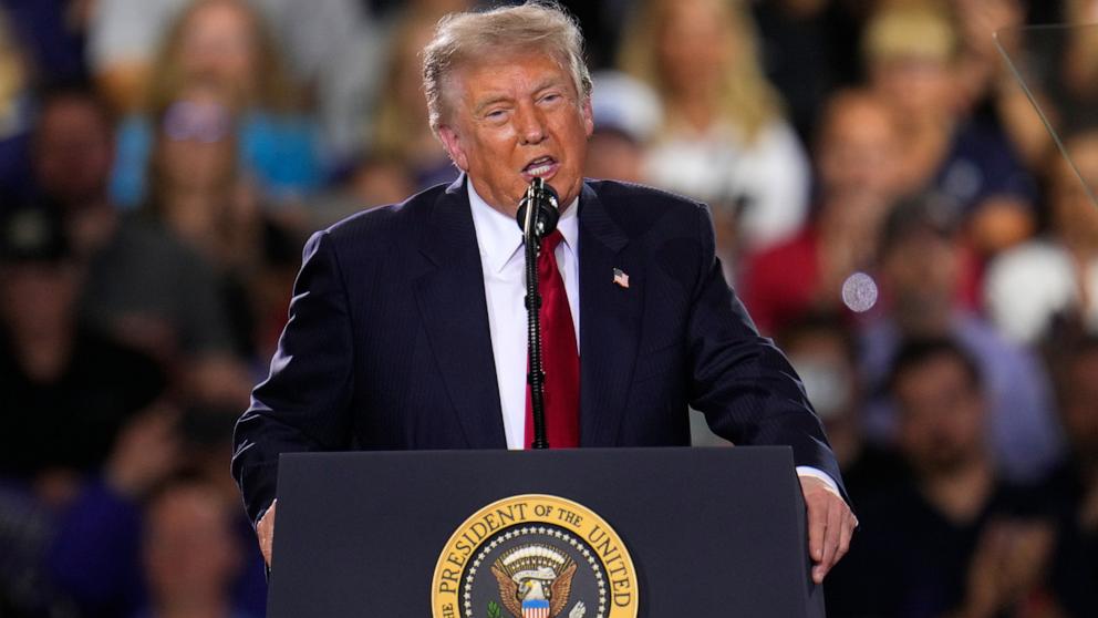 PHOTO: President Donald Trump speaks at an event at the General Motors Proving Ground, July 27, 2026, in Milford, Mich. 