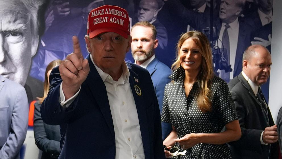 PHOTO: Republican presidential nominee and former U.S. President Donald Trump, accompanied by former U.S. first lady Melania Trump, visits his campaign headquarters to thank the campaign workers on Election Day, in West Palm Beach, Fla., Nov. 5, 2024.
