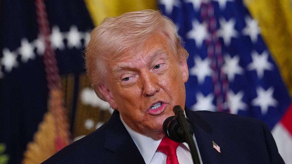 PHOTO: President Donald Trump speaks at a women's history month event in the East Room at the White House, March 12, 2026, in Washington. 