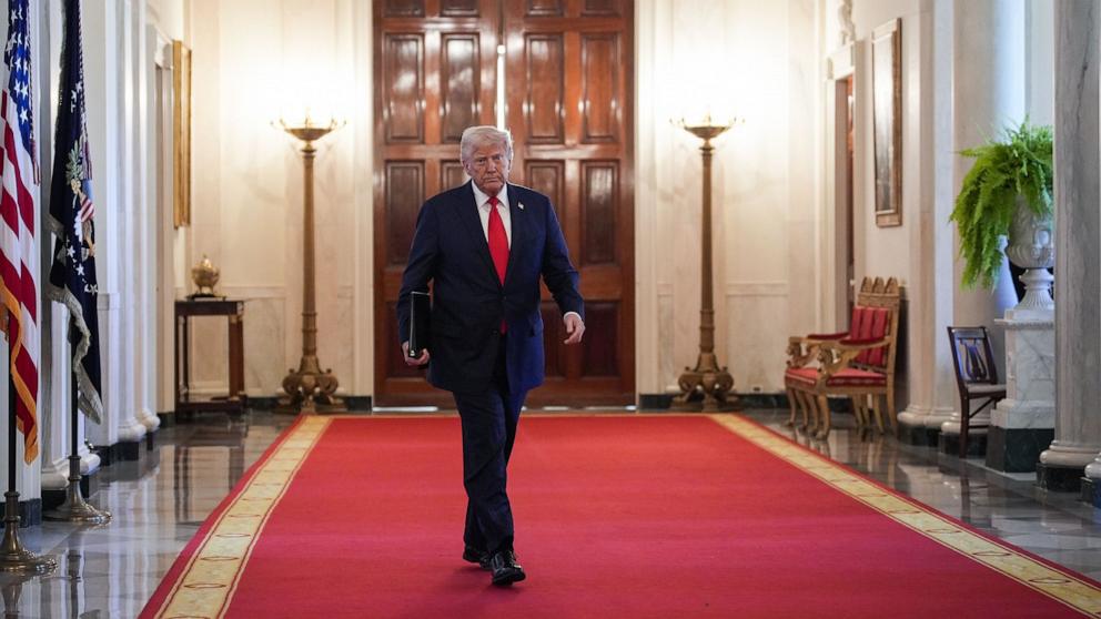 PHOTO: President Donald Trump arrives for the Commander-in-Chief Trophy Presentation to the Navy Midshipmen - the United States Naval Academy, in the East Room at the White House in Washington, April 15, 2025.